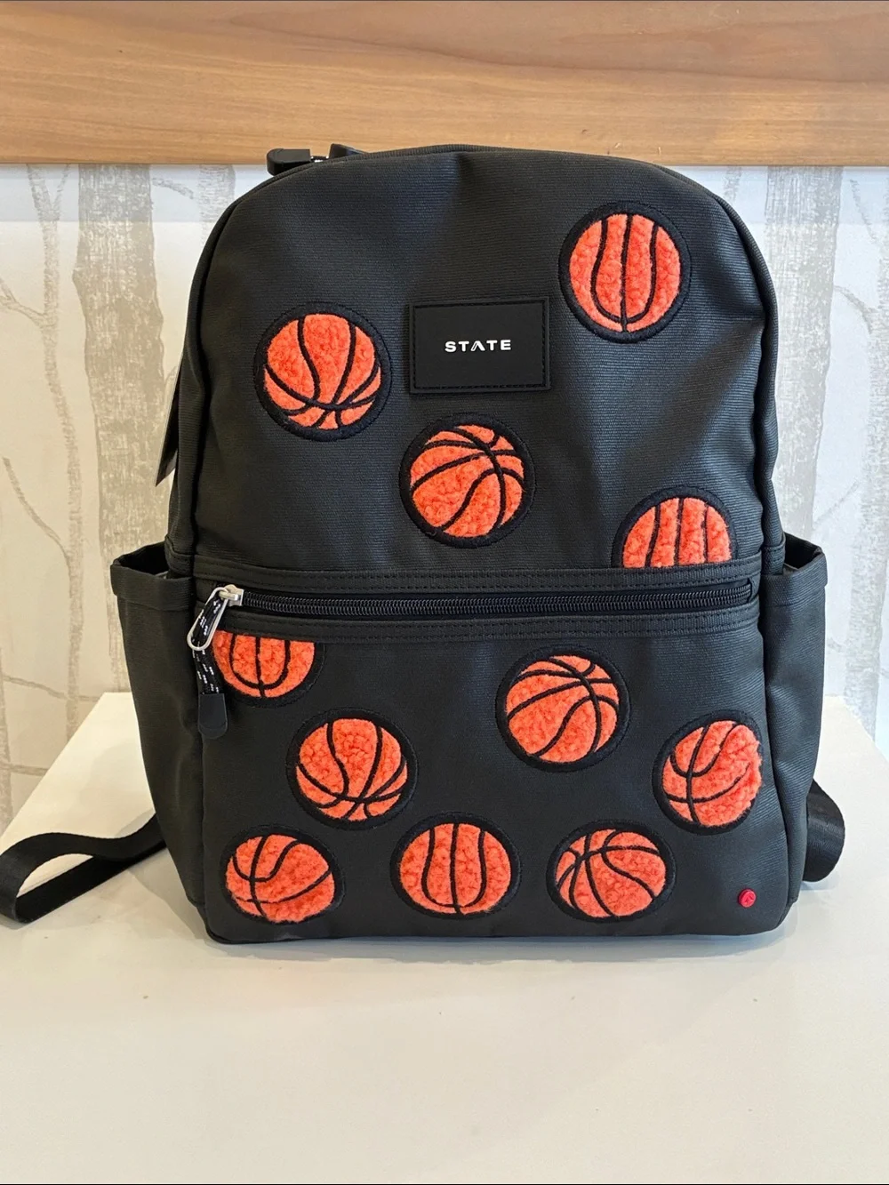STATE Black Backpack with Orange Basketball Patch Design